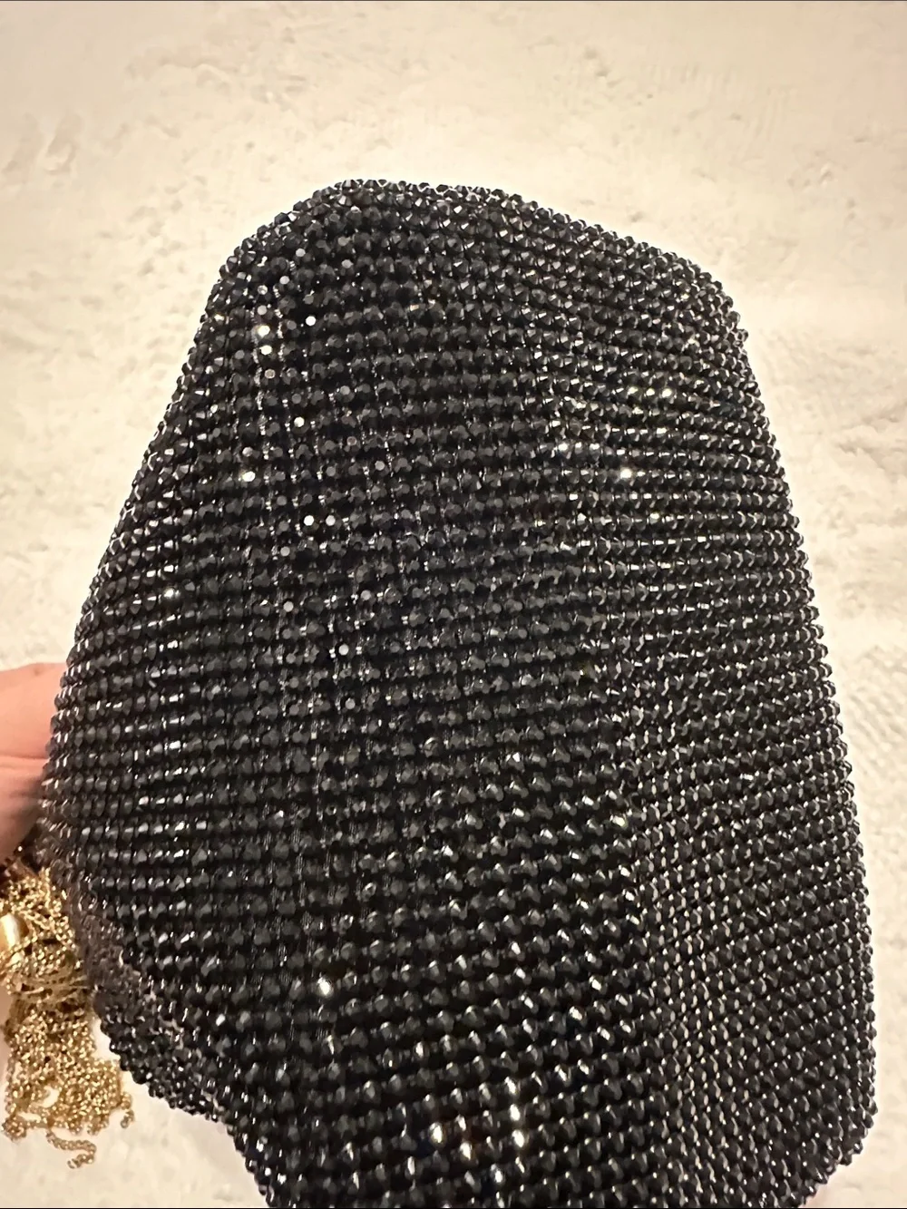 Olga Berg Black Beaded Crossbody Bucket Bag with Gold Chain & Tassels